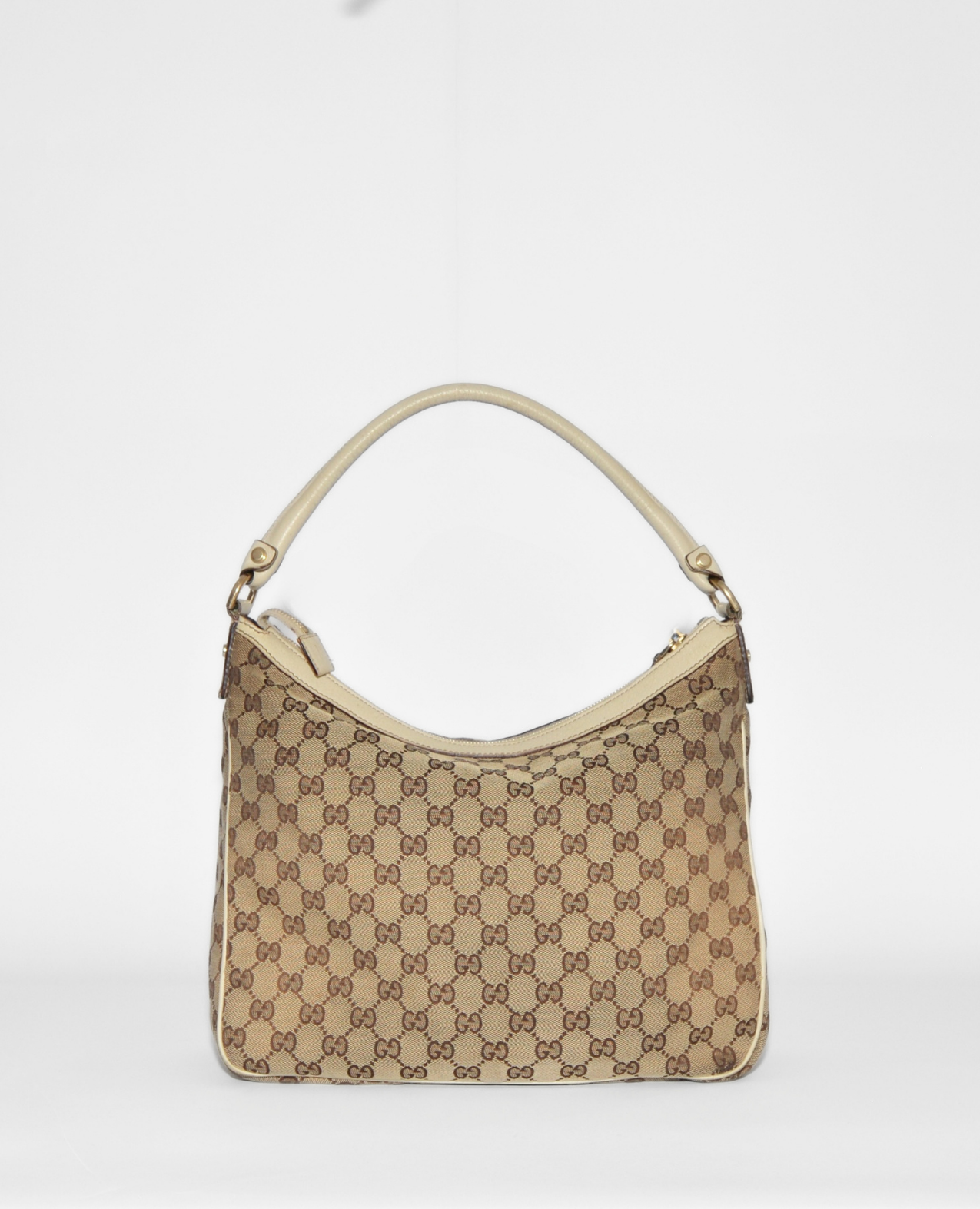Gucci vintage luxury monogram GG canvas Abbey hobo bag with beige leather trim and gold hardware. - Gucci GG Canvas Abbey Hobo Bag