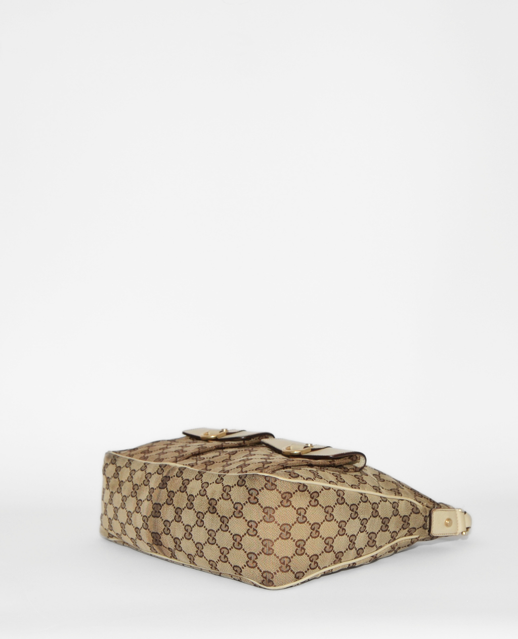 Vintage luxury Gucci GG monogram canvas Abbey hobo bag with leather trim and gold-tone hardware. - Gucci GG Canvas Abbey Hobo Bag