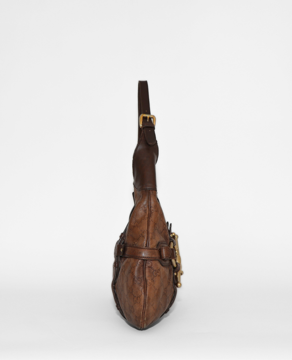 Vintage luxury Gucci Guccissima brown leather shoulder bag with embossed monogram and gold horsebit detail. - Gucci Guccissima Leather Horsebit Shoulder Bag