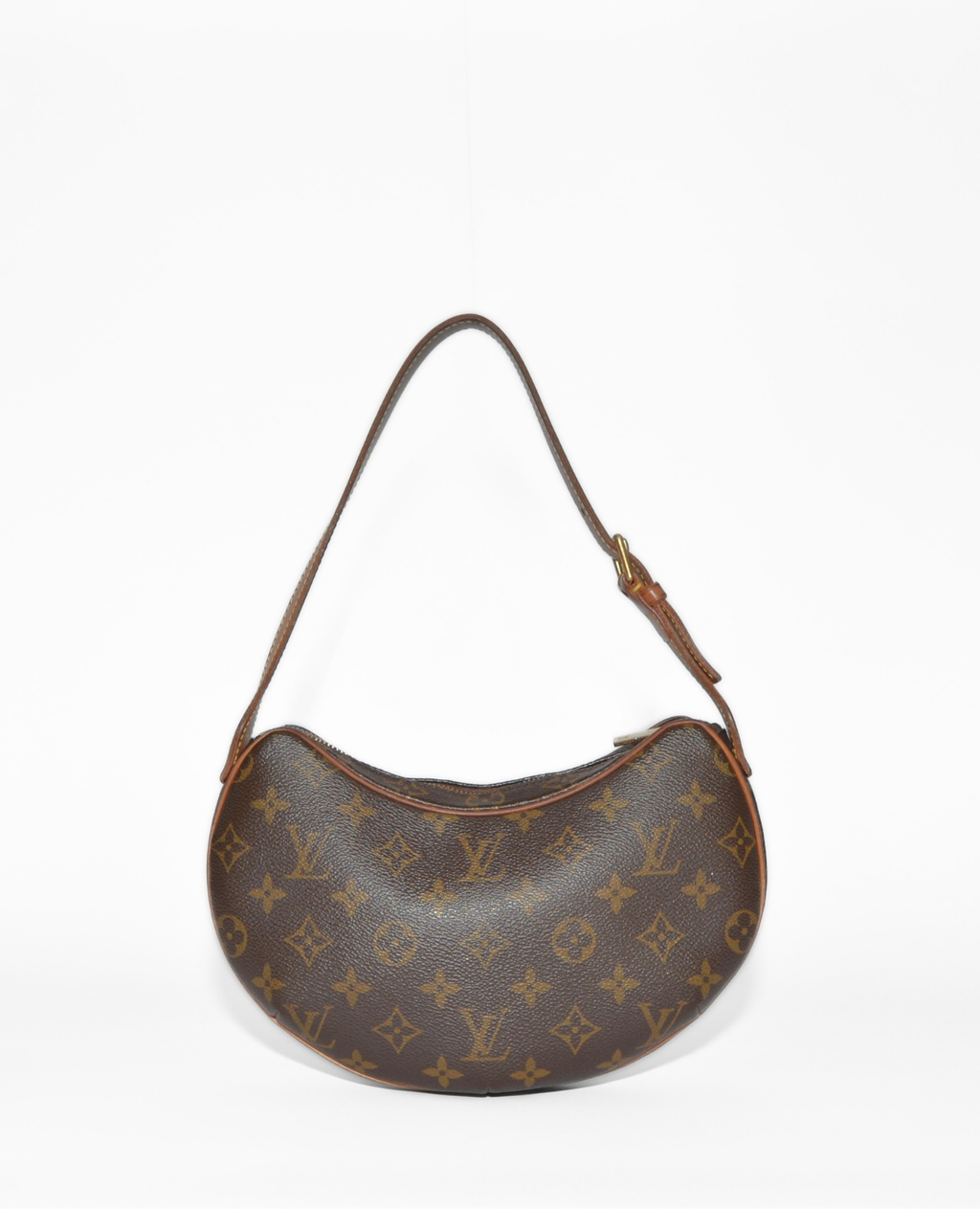 Louis Vuitton Croissant PM shoulder bag in vintage luxury monogram canvas with brown leather strap and brass hardware. - Louis Vuitton Croissant PM Canvas Shoulder Bag