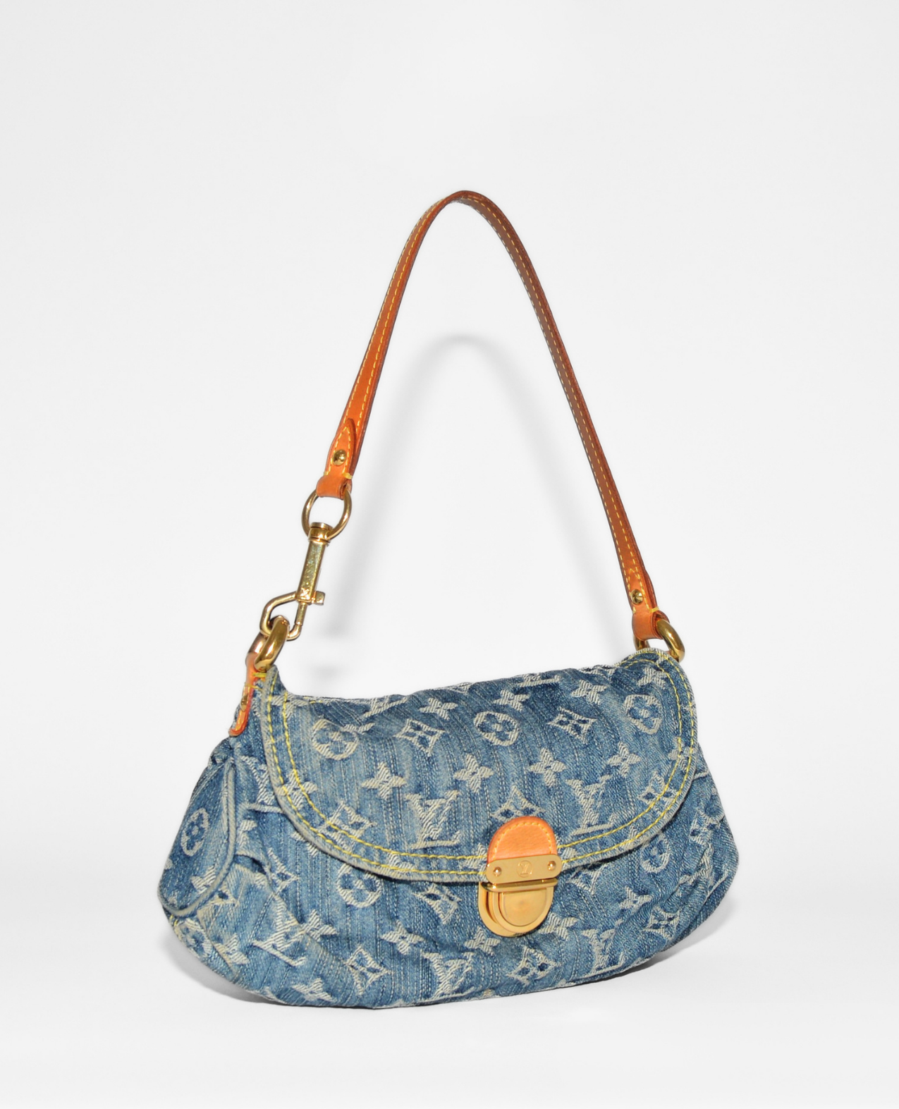Louis Vuitton Pleaty Denim Shoulder Bag with vintage luxury monogram, tan leather strap, and gold-tone clasp. - Louis Vuitton Pleaty Denim Shoulder Bag