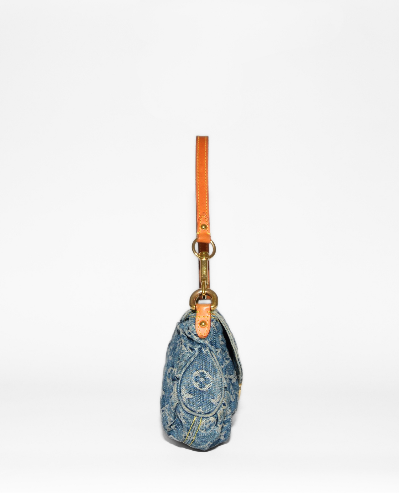 Vintage luxury Louis Vuitton Pleaty denim shoulder bag with high-end monogram and tan leather strap. - Louis Vuitton Pleaty Denim Shoulder Bag