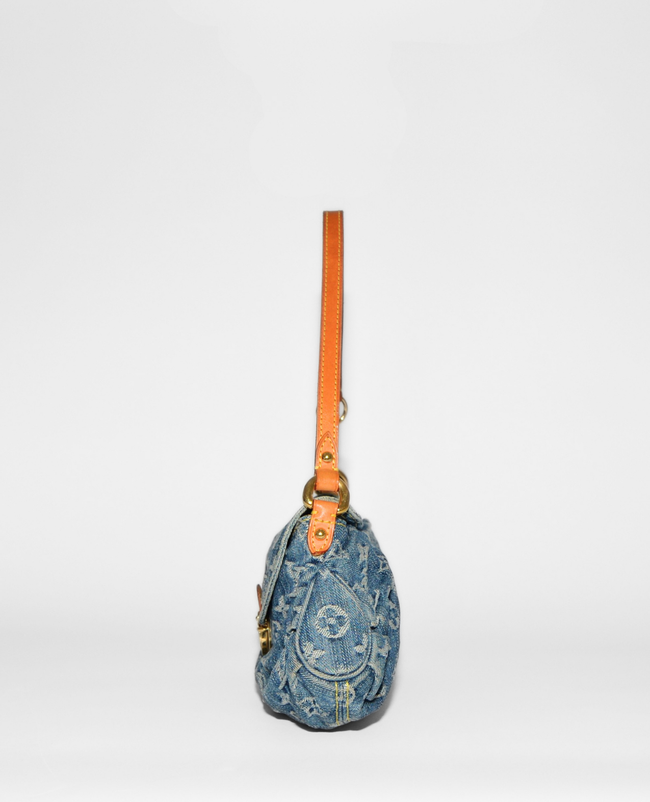 Louis Vuitton Pleaty denim shoulder bag with vintage monogram print and tan leather strap, authentic high-end designer rare. - Louis Vuitton Pleaty Denim Shoulder Bag