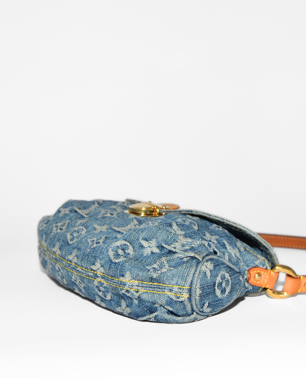 Vintage luxury Louis Vuitton Pleaty denim shoulder bag with authentic monogram and leather strap detail. - Louis Vuitton Pleaty Denim Shoulder Bag