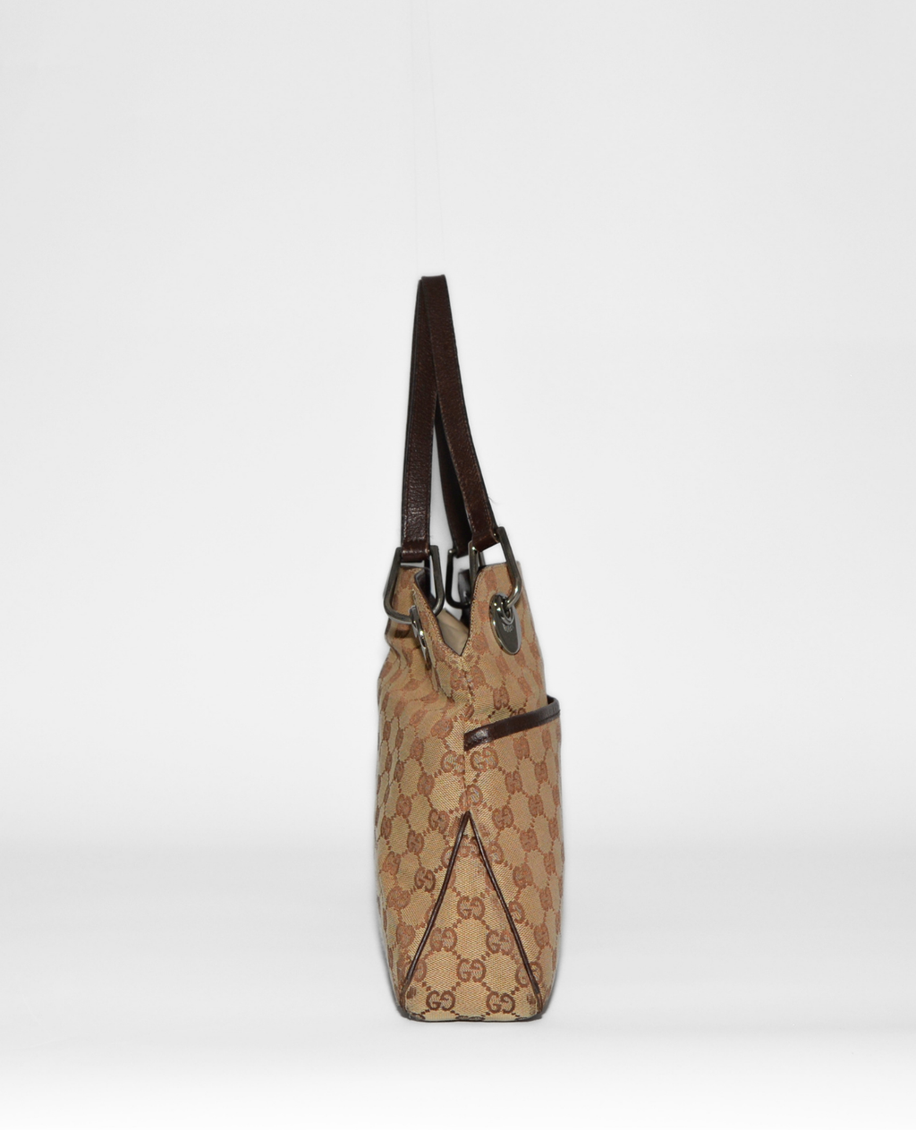 Gucci vintage luxury shoulder bag with iconic brown monogram canvas and dark leather straps, rare authentic designer piece. - Gucci GG Canvas Eclipse Shoulder Bag