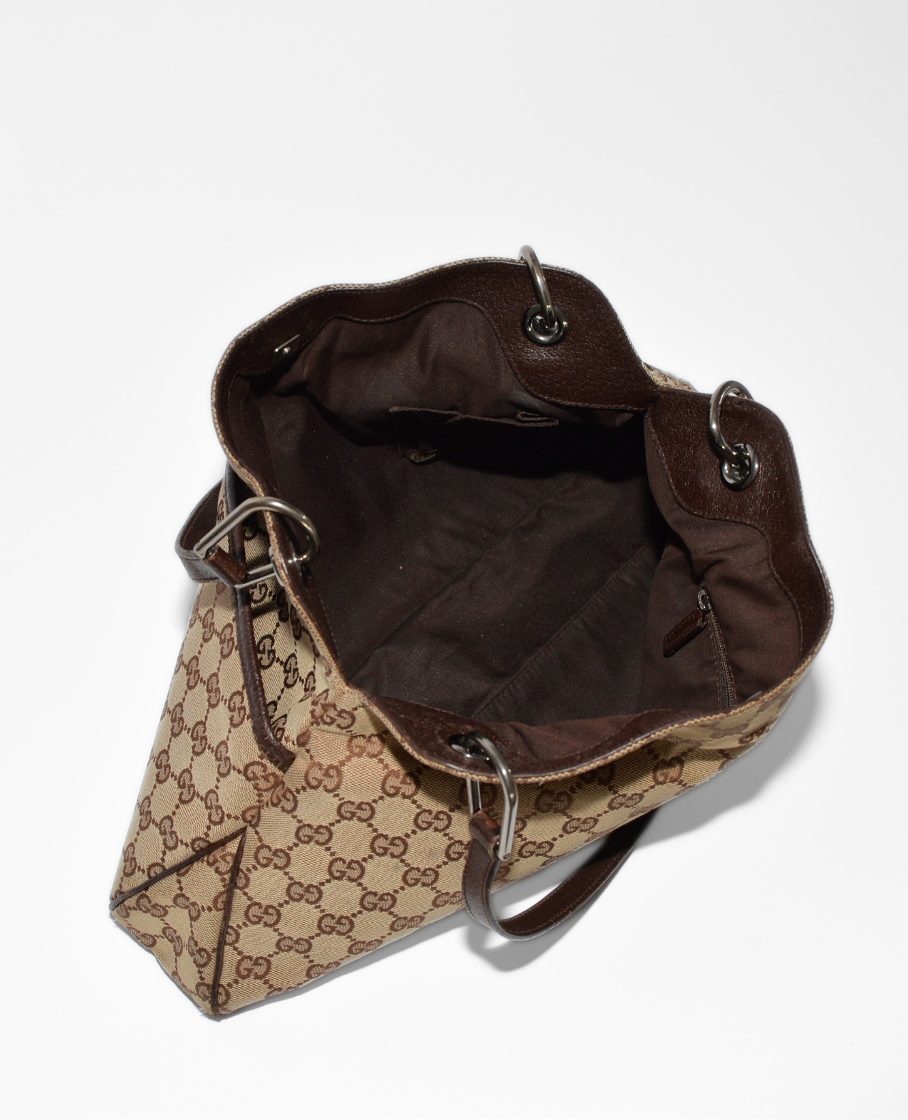 Gucci vintage luxury shoulder bag with authentic brown monogram canvas and leather trim, rare high-end designer piece. - Gucci GG Canvas Eclipse Shoulder Bag
