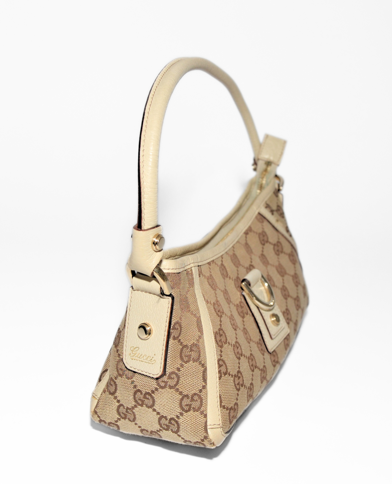 Gucci GG Canvas Abbey D-Ring Pochette in beige monogram canvas with leather trim and gold-tone hardware, vintage luxury. - Gucci GG Canvas Abbey D-Ring Pochette