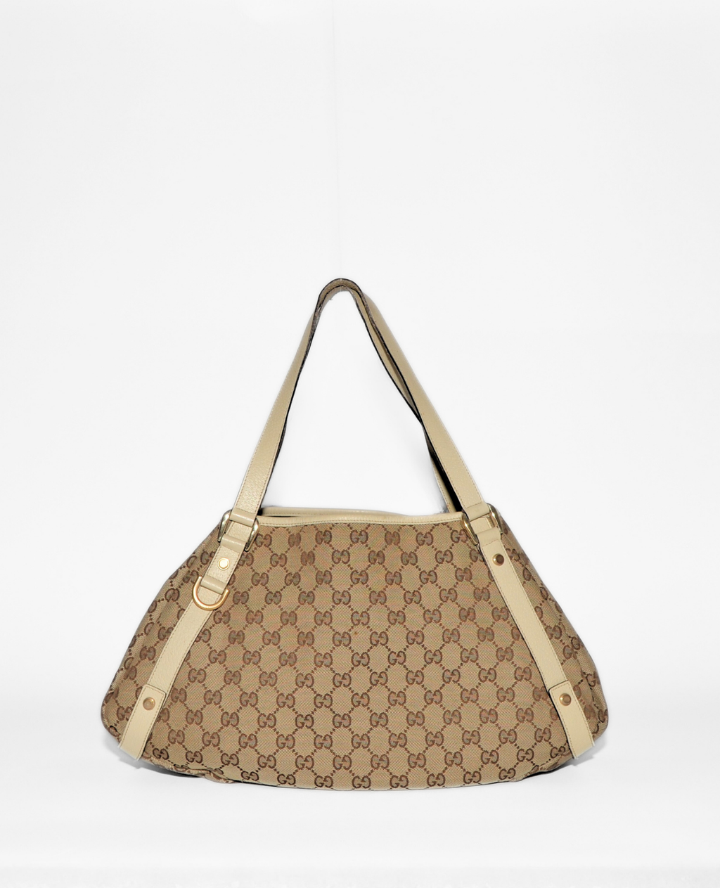 Gucci vintage luxury tote bag with authentic beige monogram canvas and leather trim, rare high-end designer accessory. - Gucci GG Canvas Abbey Tote Bag