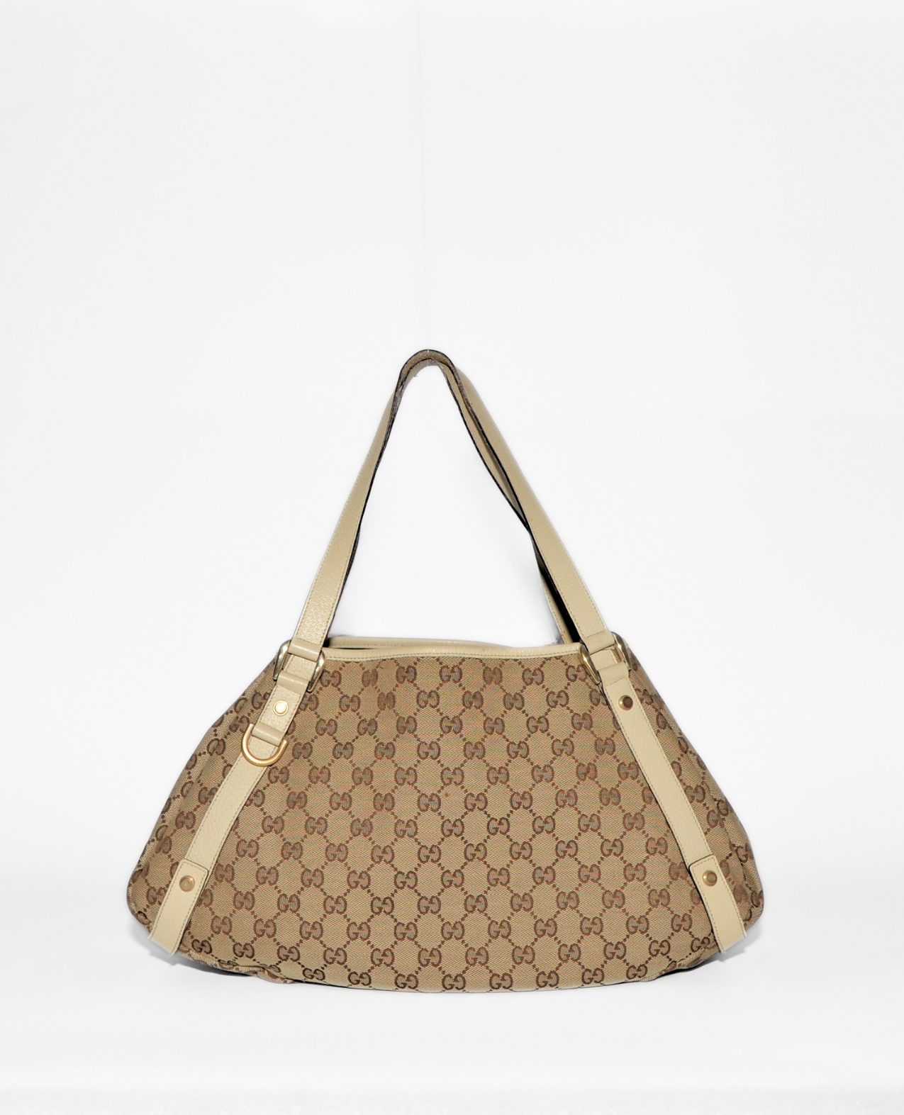 Gucci vintage luxury tote bag with authentic beige monogram canvas and leather trim, rare high-end designer accessory. - Gucci GG Canvas Abbey Tote Bag