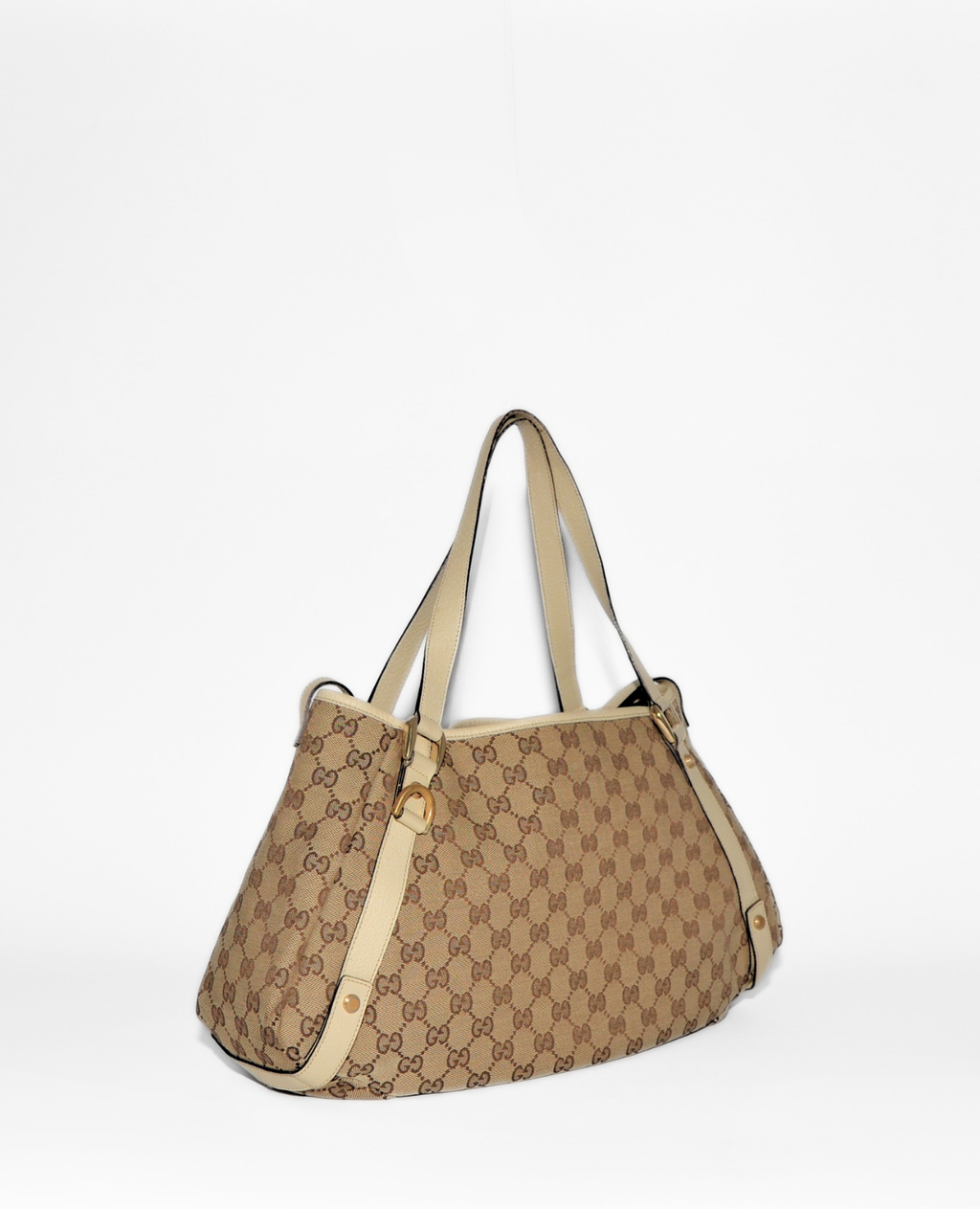 Gucci vintage luxury monogram canvas Abbey tote bag with beige leather trim and gold hardware. - Gucci GG Canvas Abbey Tote Bag