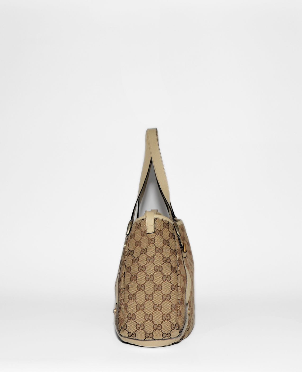 Gucci vintage luxury tote bag with iconic brown monogram canvas and tan leather trim, rare authentic designer style. - Gucci GG Canvas Abbey Tote Bag