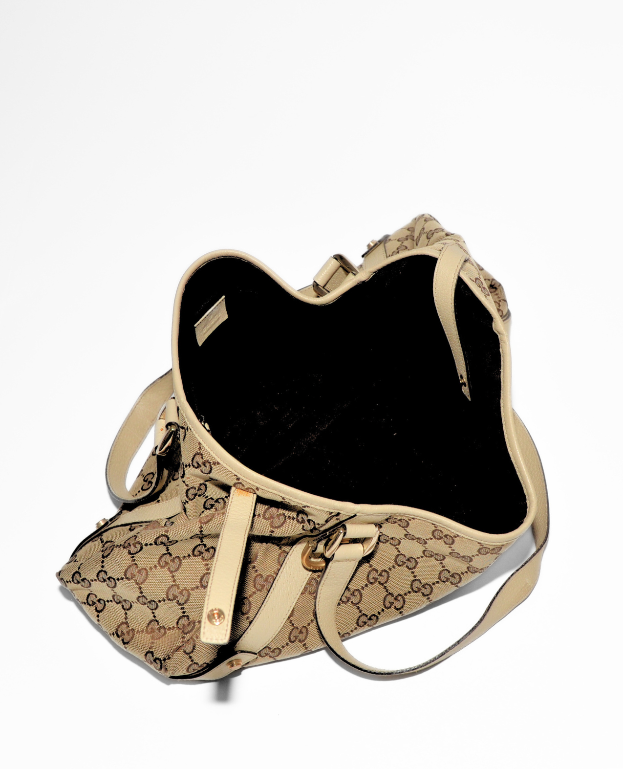 Beige Gucci GG monogram canvas Abbey tote bag with leather trim, gold-tone hardware, and spacious open interior vintage. - Gucci GG Canvas Abbey Tote Bag