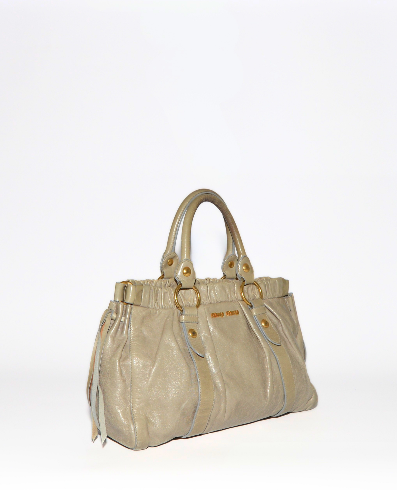 Beige Miu Miu Vitello leather handbag with gold hardware and monogram logo, vintage luxury designer piece. - Miu Miu Vitello Leather Handbag