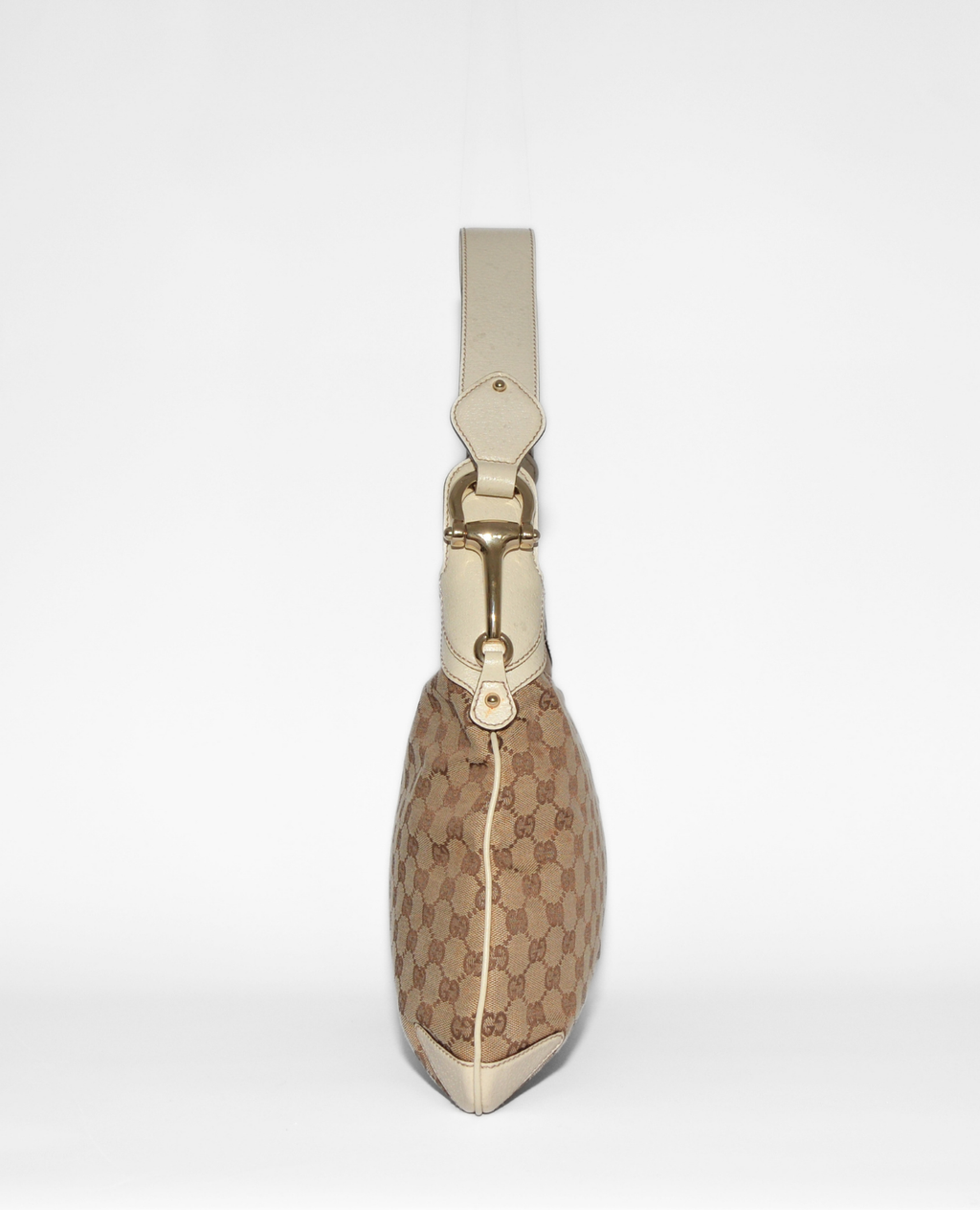 Slim vintage luxury Gucci GG monogram canvas shoulder bag with cream leather trim and gold horsebit hardware. - Gucci GG Canvas Horsebit Shoulder Bag