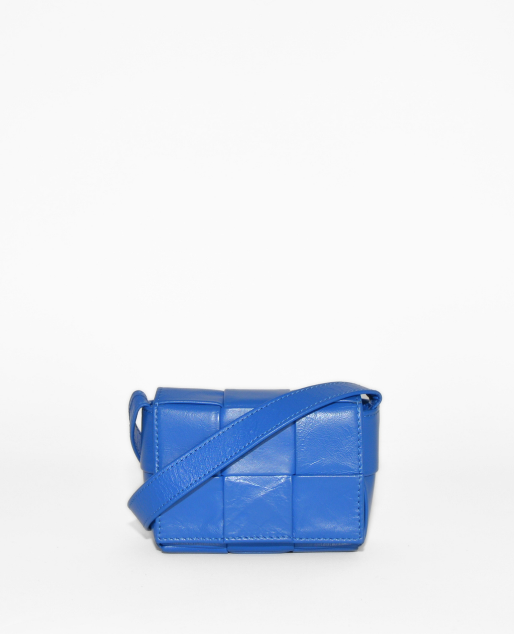 Blue leather Bottega Veneta Mini Casette crossbody bag with signature woven monogram, vintage luxury design. - Bottega Veneta Mini Casette Crossbody Bag