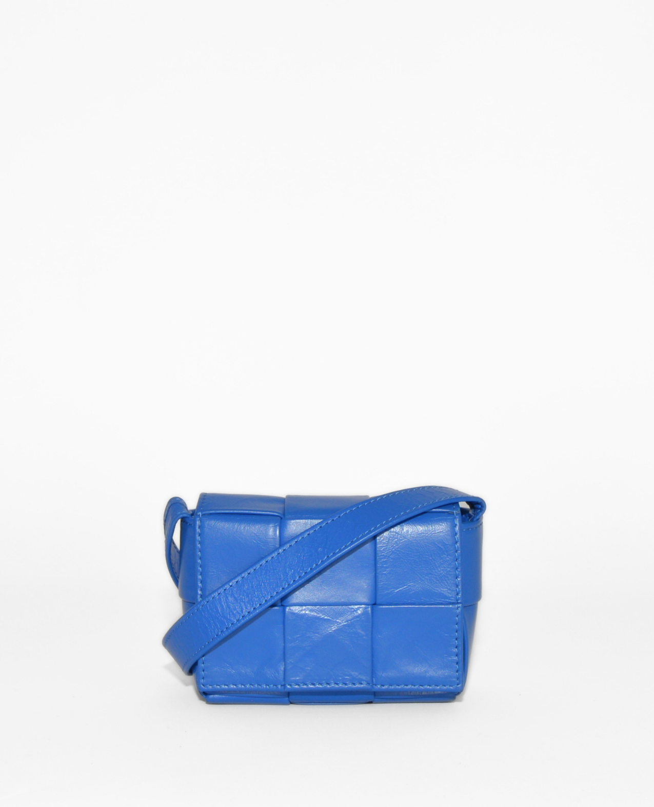 Blue leather Bottega Veneta Mini Casette crossbody bag with signature woven monogram, vintage luxury design. - Bottega Veneta Mini Casette Crossbody Bag