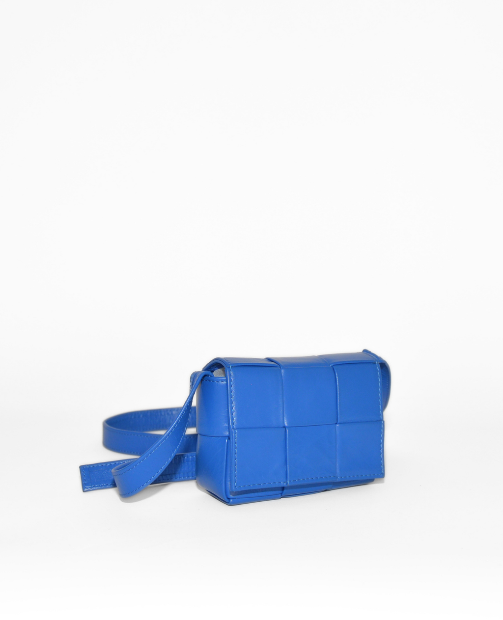 Blue Bottega Veneta Mini Casette crossbody bag with signature woven leather pattern, vintage luxury designer accessory. - Bottega Veneta Mini Casette Crossbody Bag