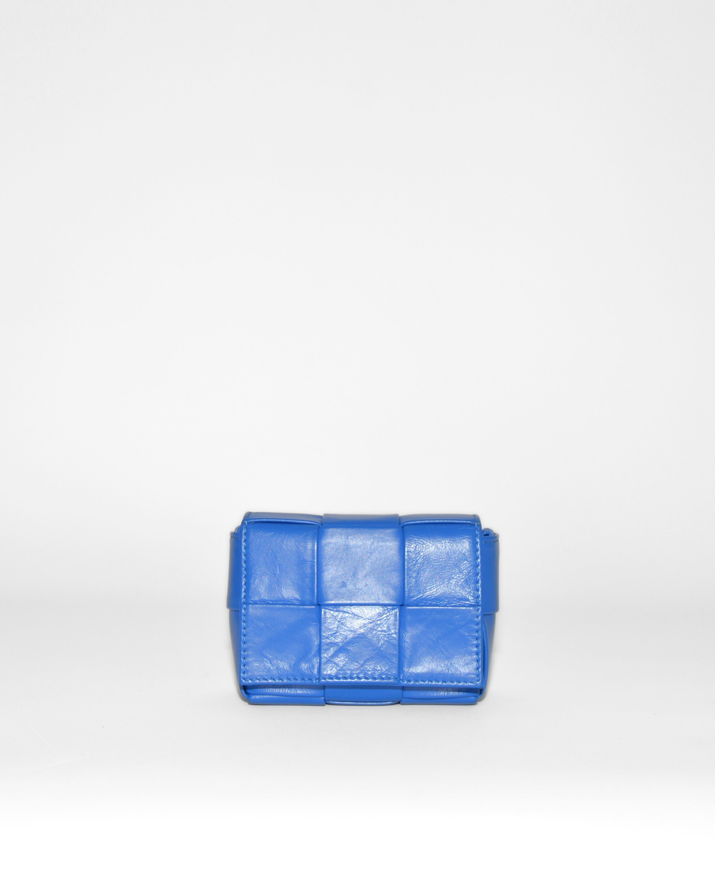 Blue leather Bottega Veneta Mini Cassette crossbody bag featuring iconic woven monogram design, vintage luxury, rare. - Bottega Veneta Mini Casette Crossbody Bag