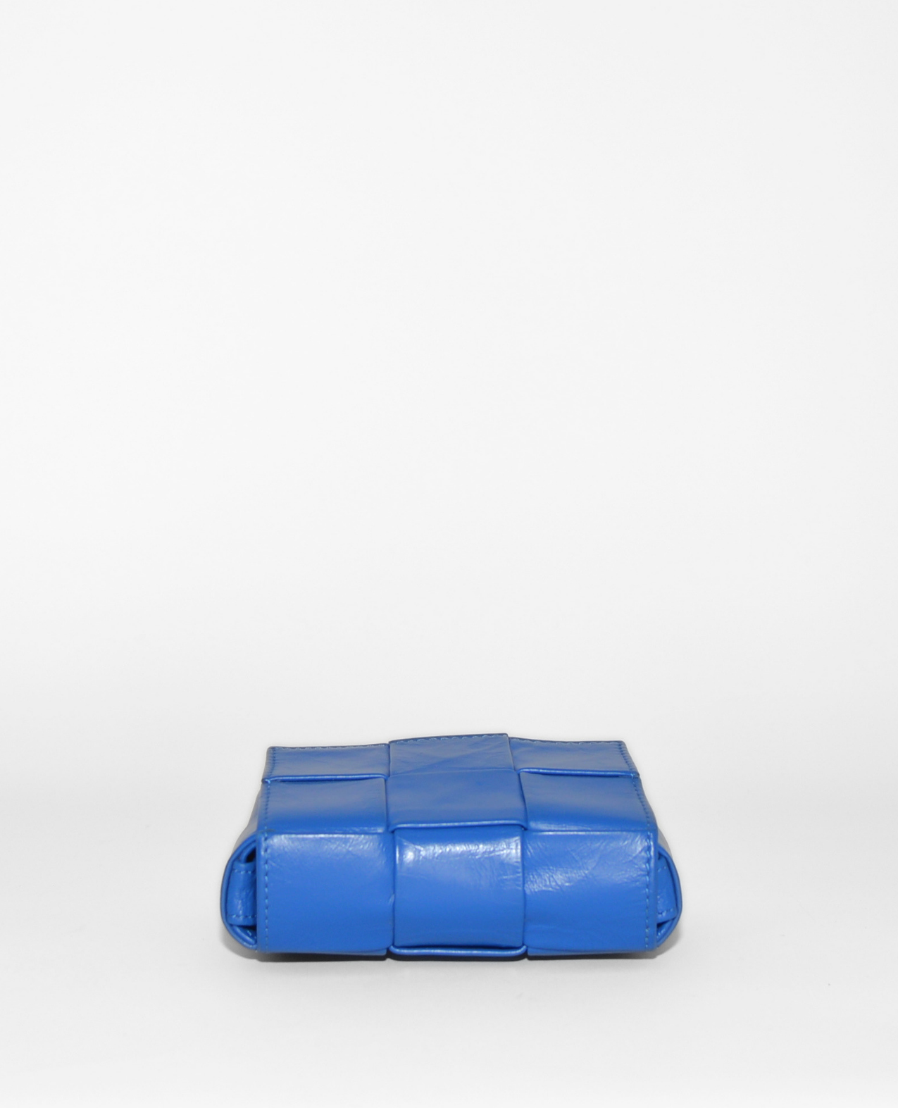 Blue Bottega Veneta Mini Cassette crossbody bag with signature woven leather design, vintage luxury style, authentic. - Bottega Veneta Mini Casette Crossbody Bag